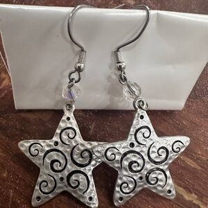 Silver star dangle earrings